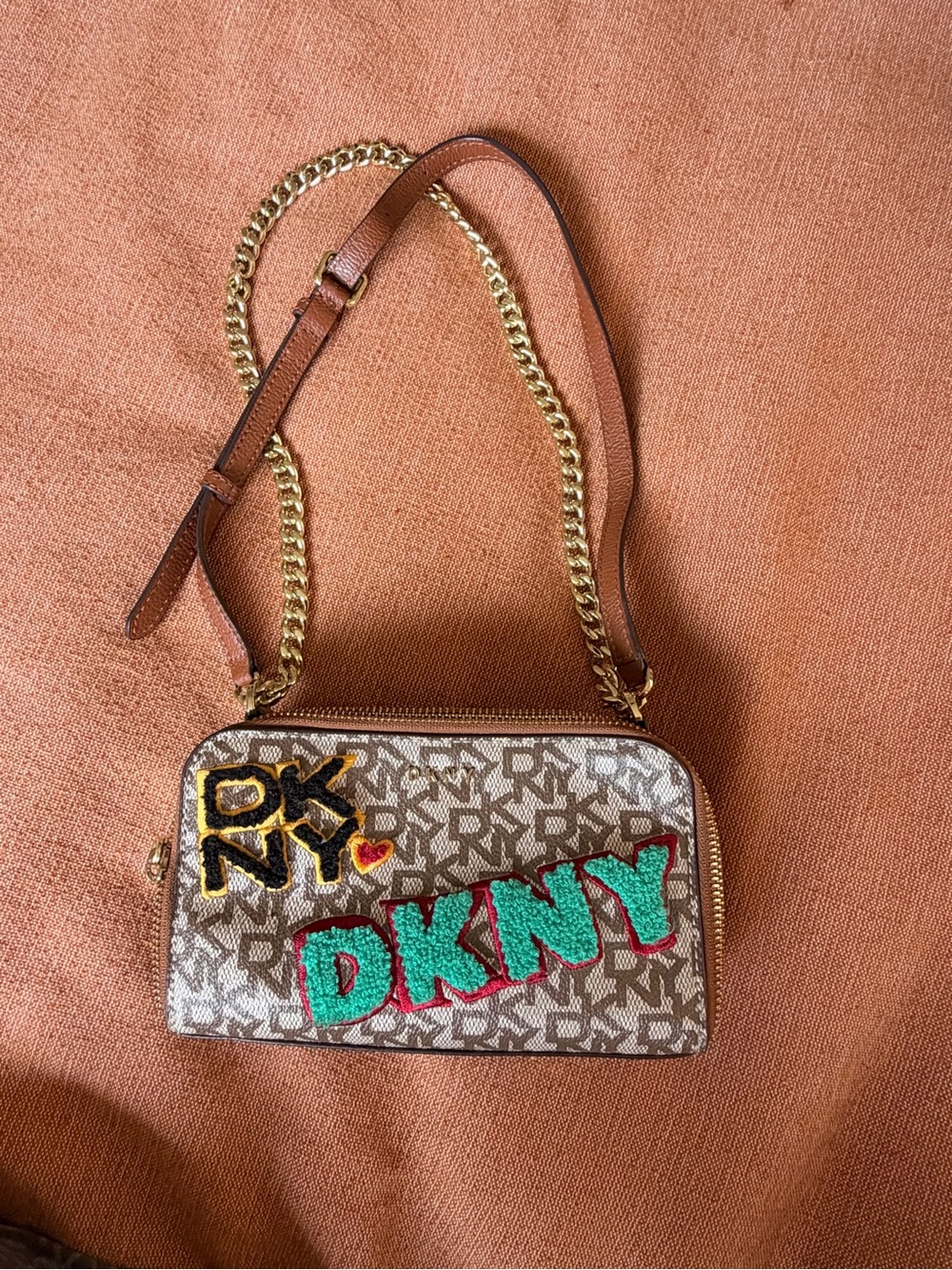 DKNY Brown Monogram Crossbody with Teal and Yellow Logo Accents